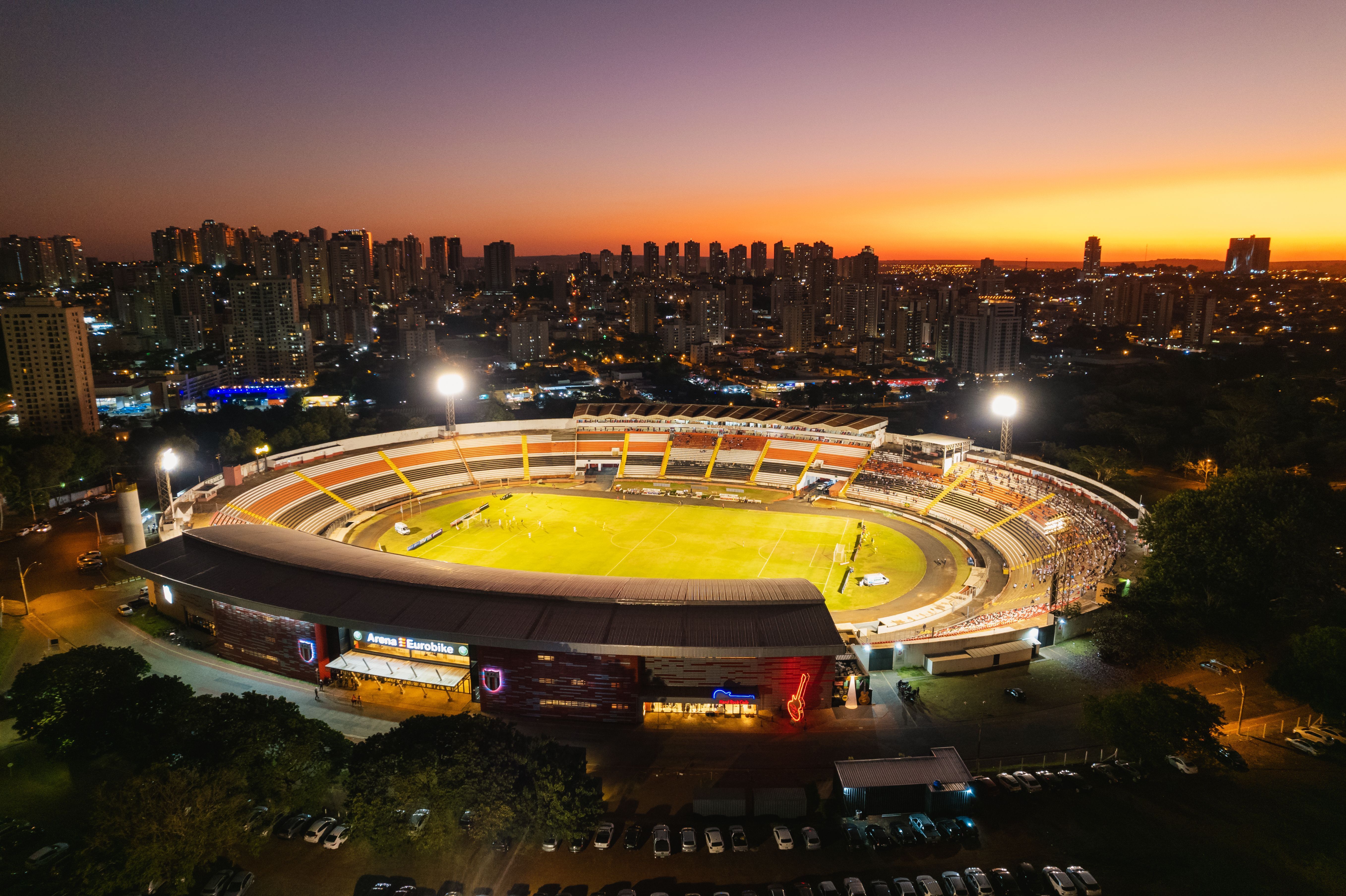 Ribeirão Preto, São Paulo/Brazil - Circa June 2022: Aerial view of Ribeirão Preto, São Paulo, you can see buildings and Santa Cruz Botafogo Stadium. sunset, early evening.