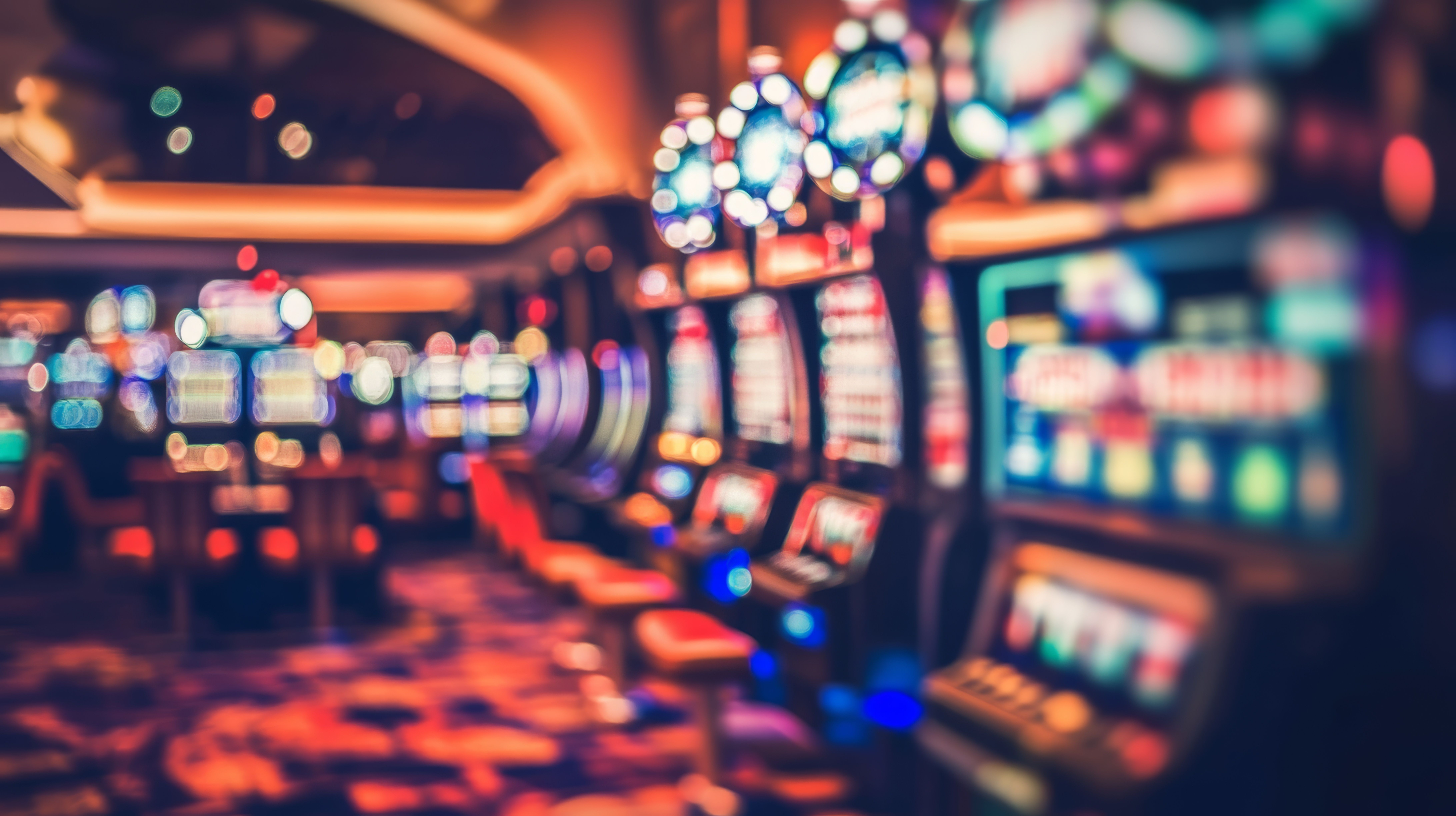 Vibrant casino interior reflecting the thrill of online gambling showcasing money games with a dynamic blurred background for an immersive experience