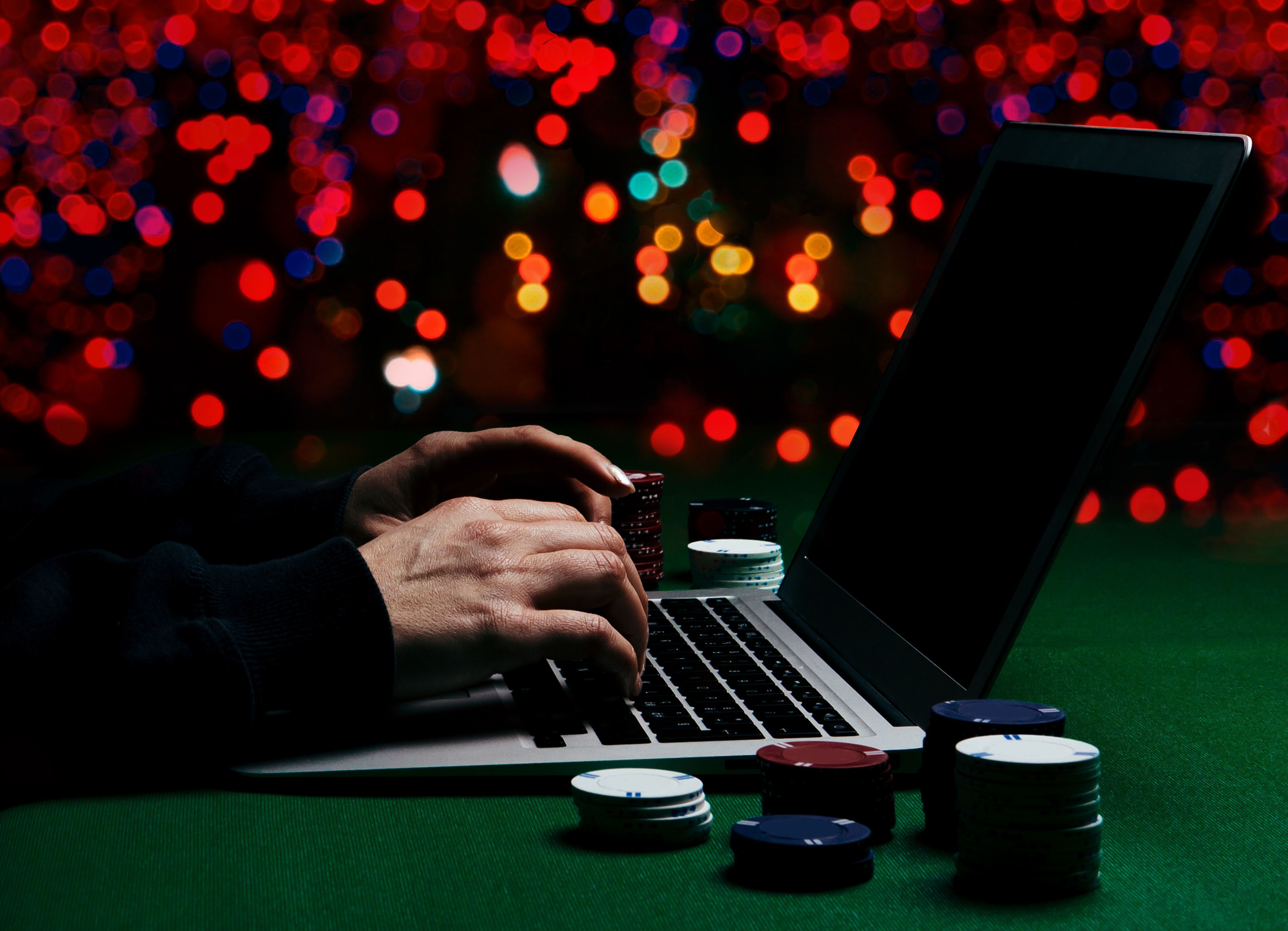 Person playing online poker and looking winning cards. Concept win and lose in casino.