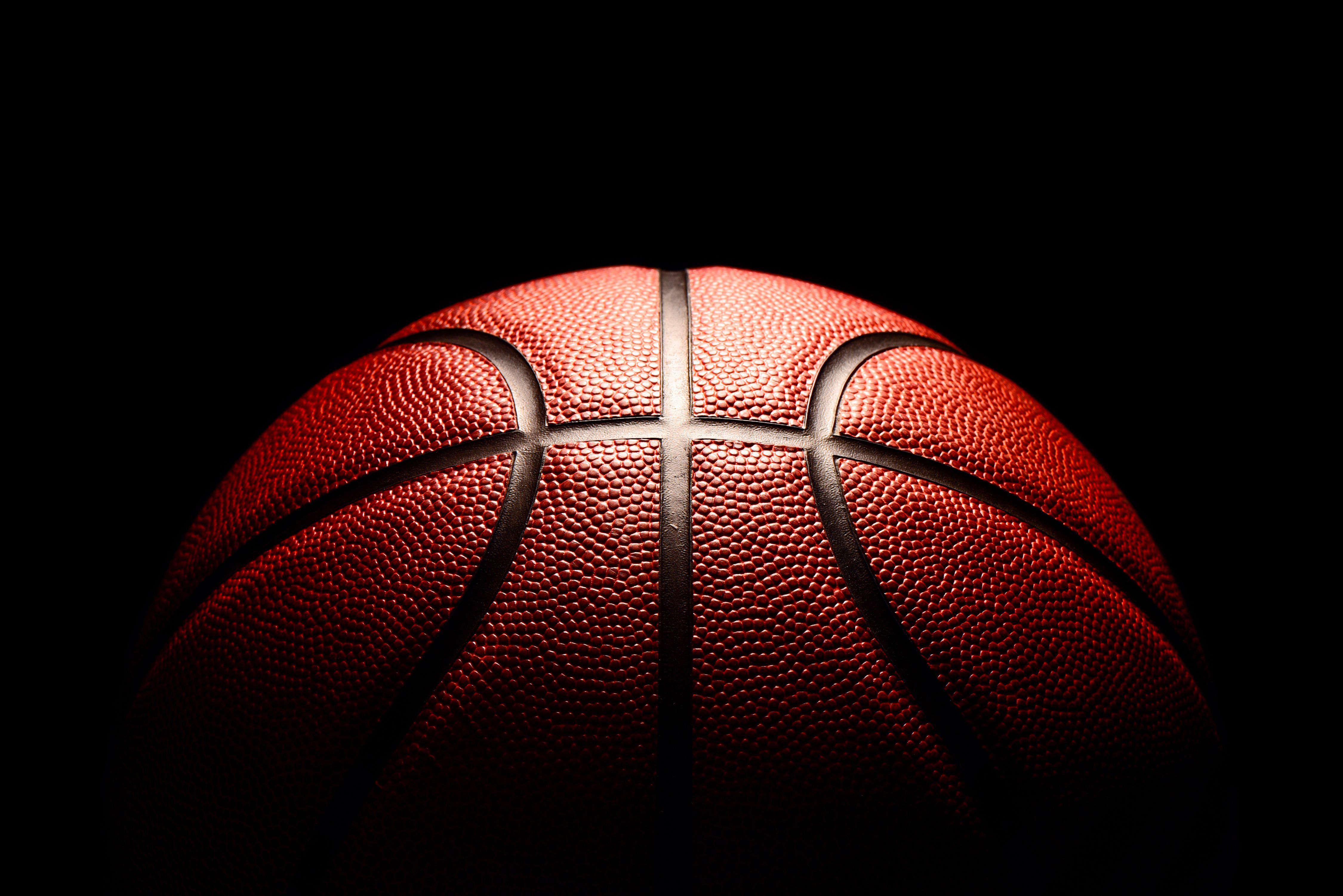basketball on black background.