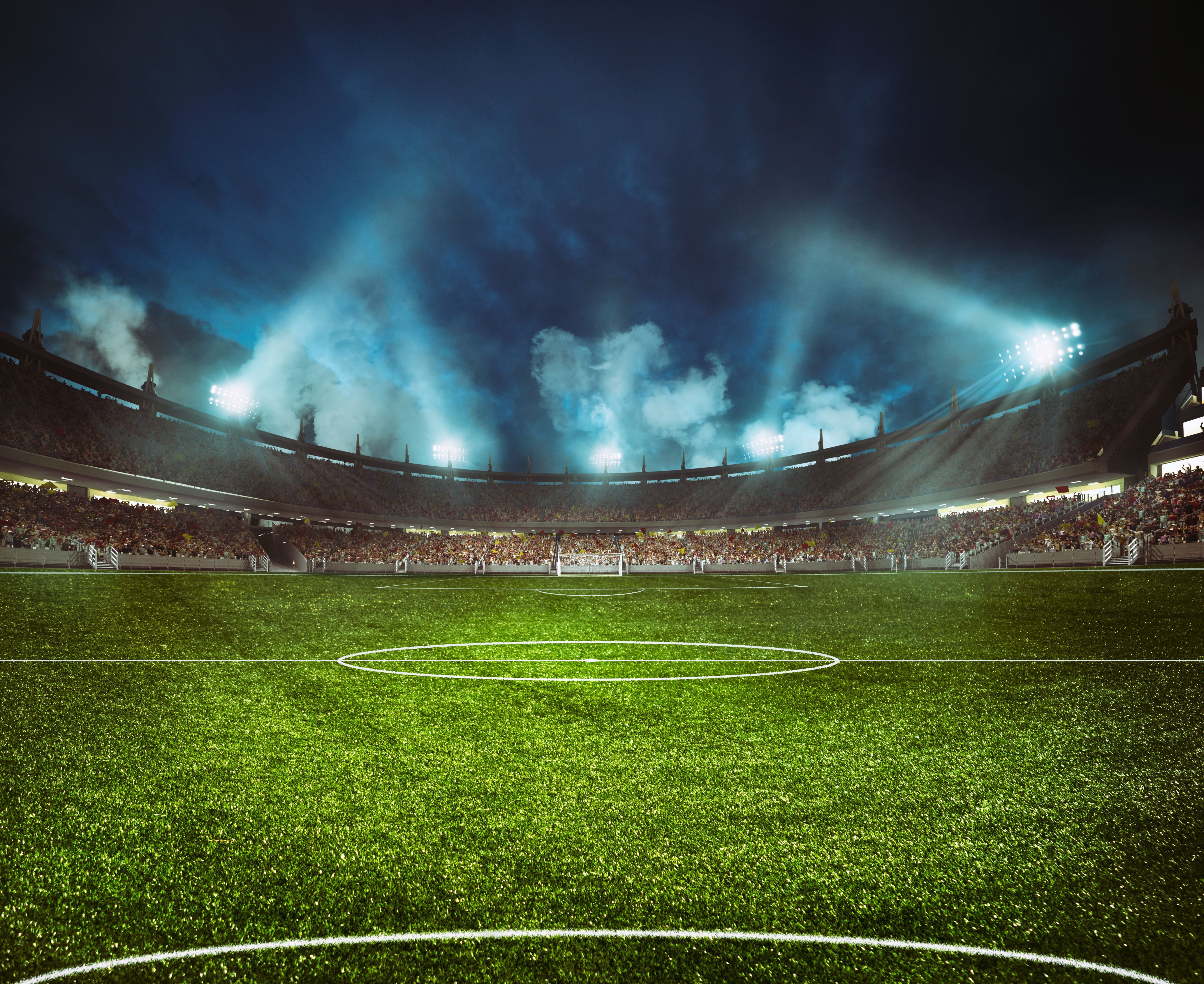 Football stadium with the stands full of fans waiting for the night game