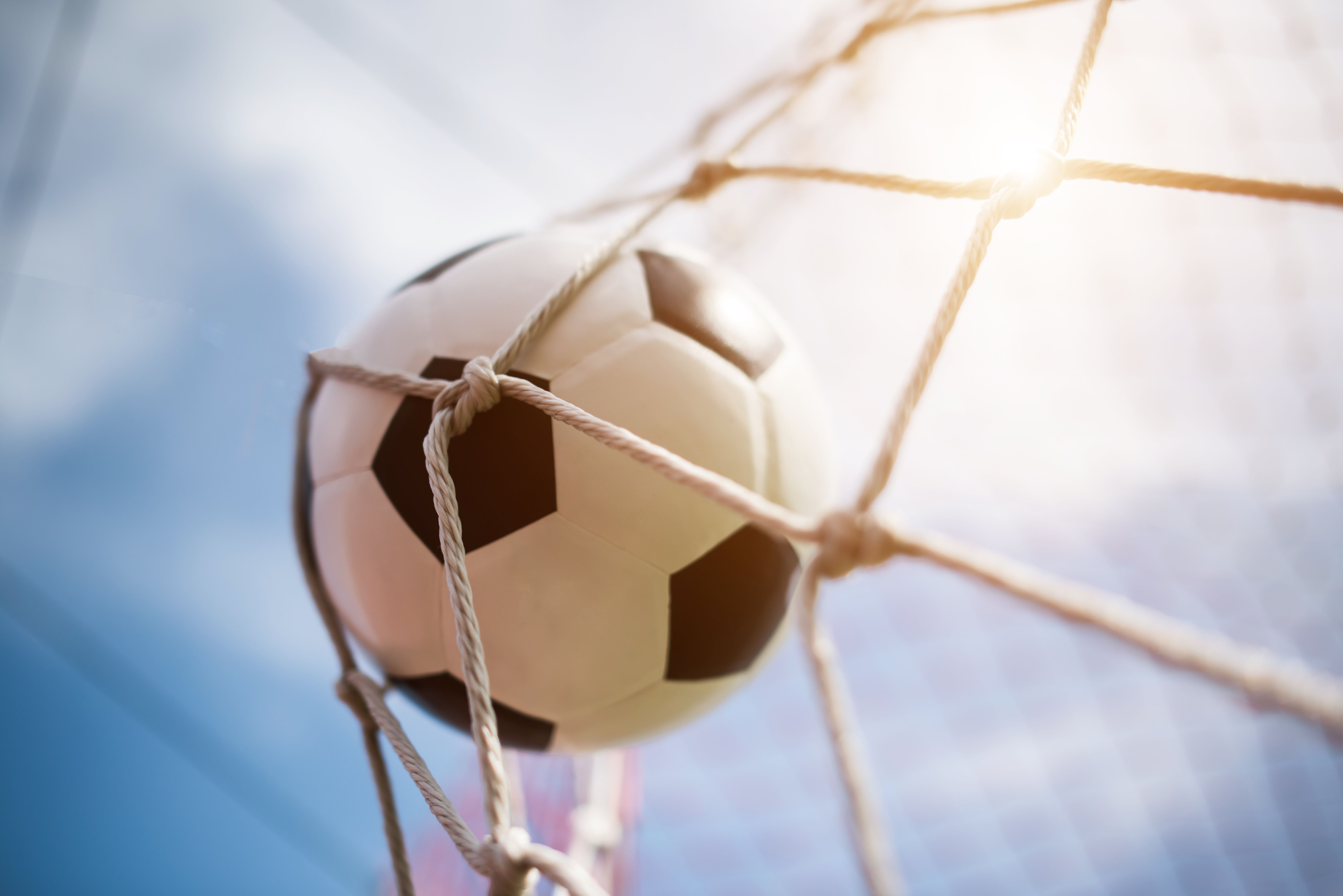 Soccer into goal success concept