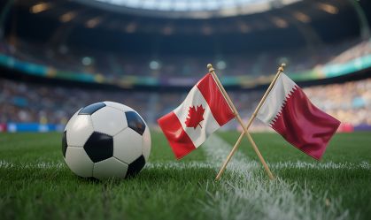 Soccer ball on grass with flags of Canada and Qatar on the pitch in a large professional stadium