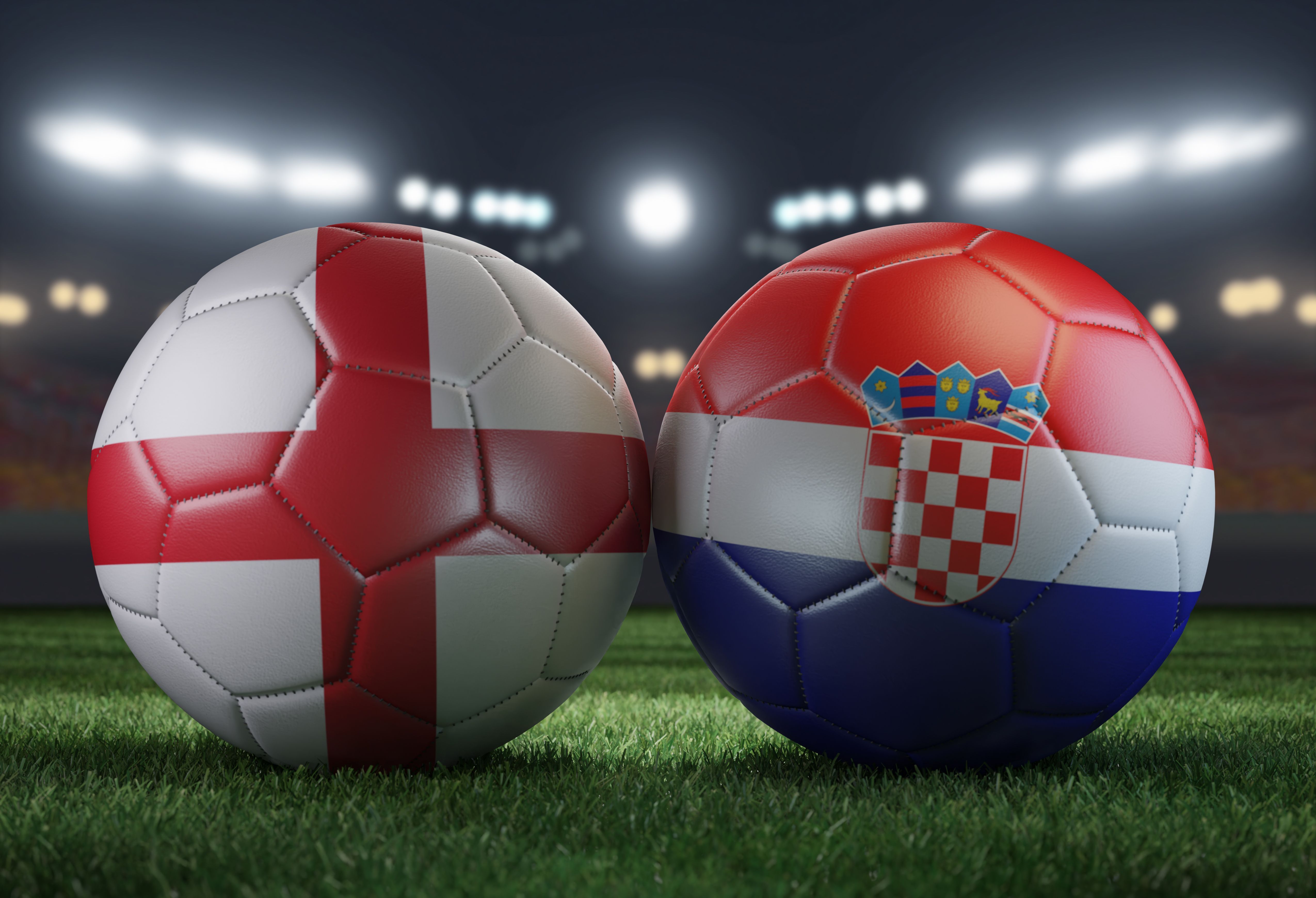 Two soccer balls in flags colors on a stadium blurred background. England vs Croatia. 3D image.